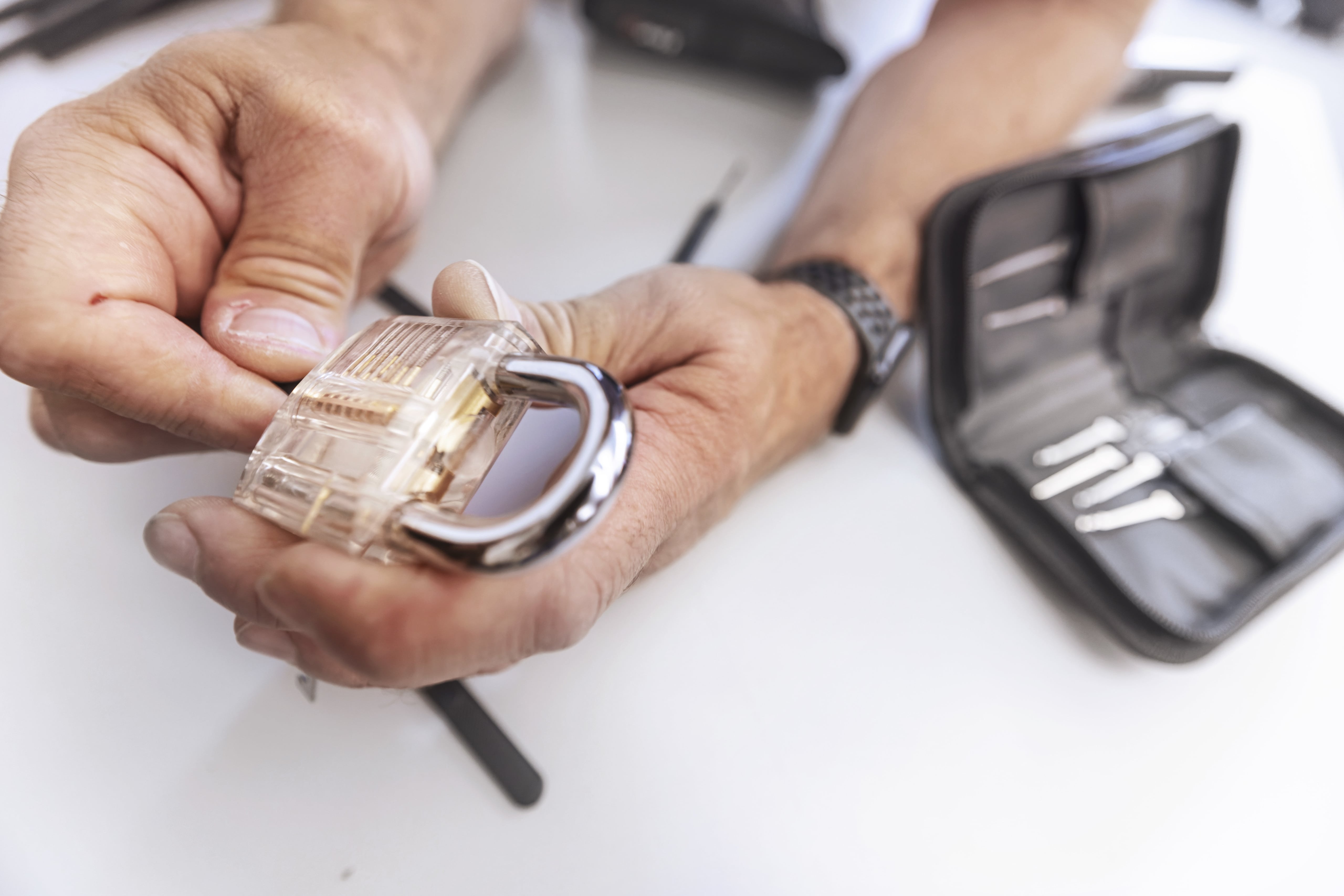 instructor holding a lock